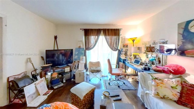 living area with dark wood-type flooring