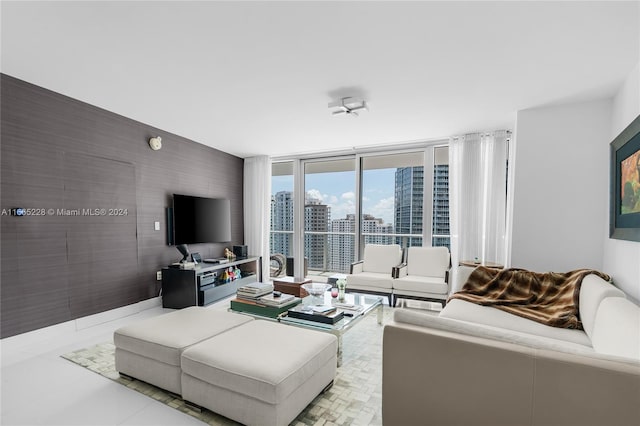 living room with floor to ceiling windows