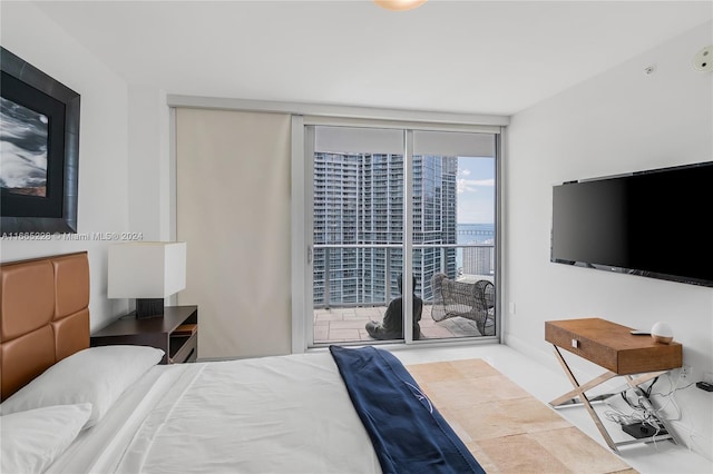 bedroom with multiple windows