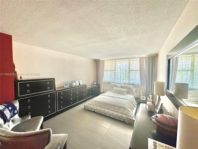 bedroom featuring a textured ceiling