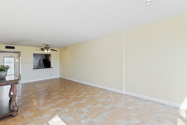 empty room featuring ceiling fan