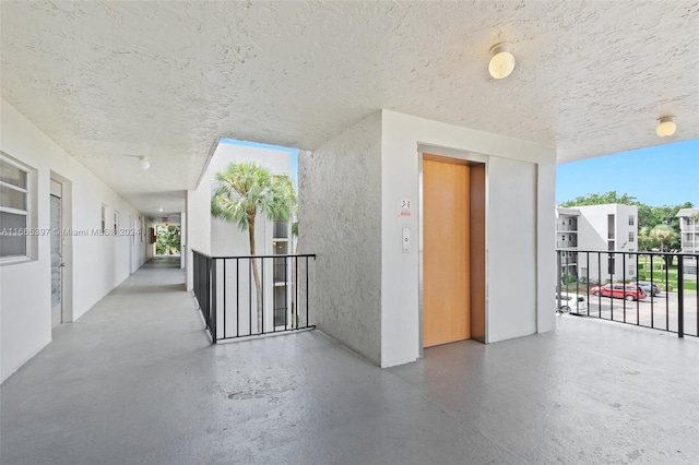 view of patio / terrace with elevator