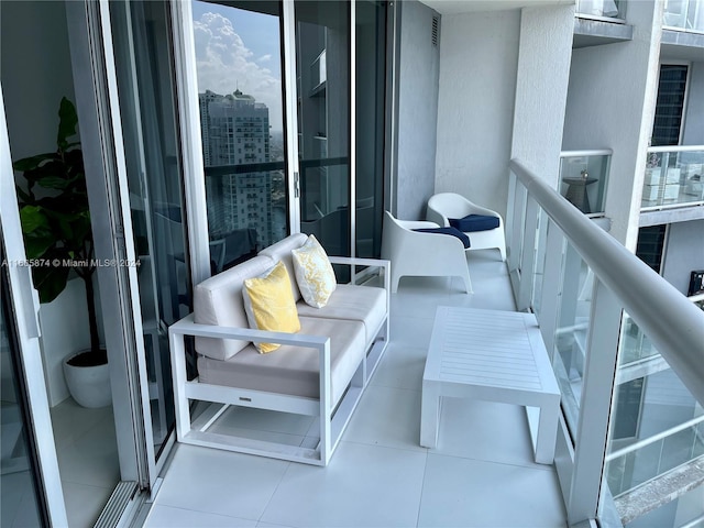 living room with floor to ceiling windows