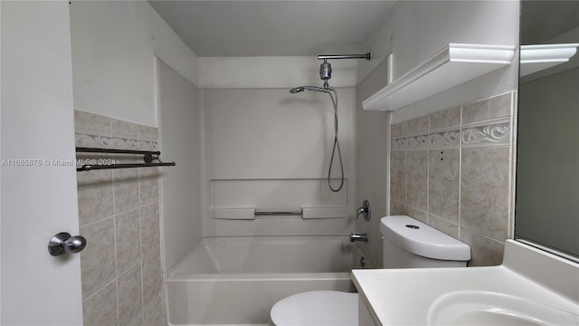 full bathroom featuring tile walls, shower / washtub combination, vanity, and toilet