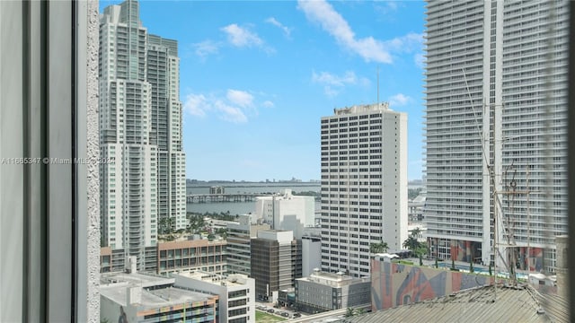 property's view of city with a water view