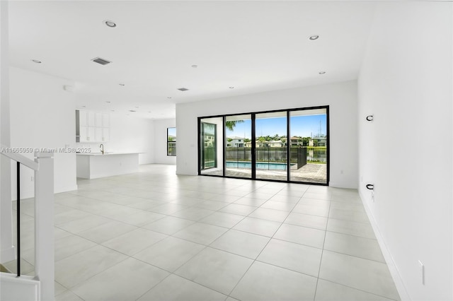 8095 Crystal Downs Ave, Boca Raton, FL 33434 - spare room featuring light tile patterned flooring and recessed lighting