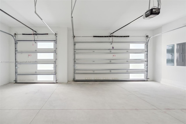 8095 Crystal Downs Ave, Boca Raton, FL 33434 - garage with a garage door opener and electric panel