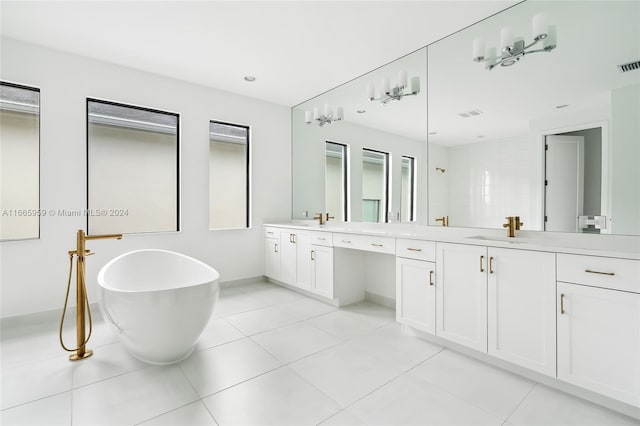 bathroom with vanity, tile patterned flooring, and separate shower and tub