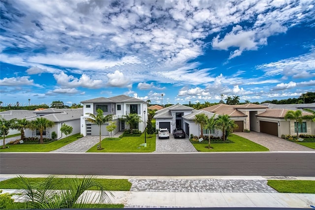 8095 Crystal Downs Ave, Boca Raton, FL 33434 - view of front of property featuring a residential view, decorative driveway, a garage, a front lawn, and stucco siding