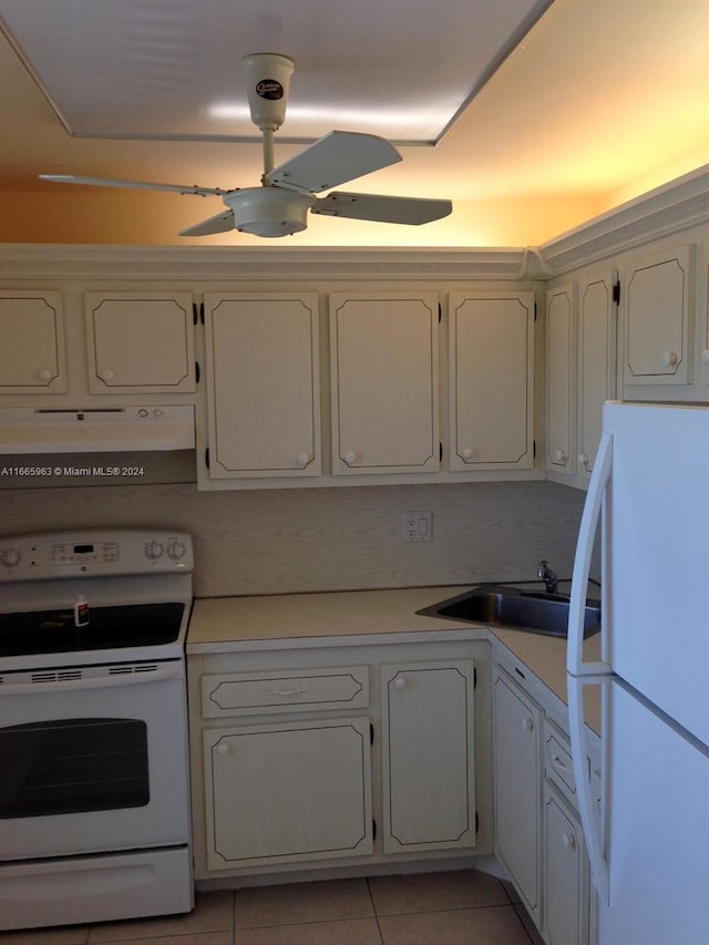 kitchen with light tile patterned flooring, white cabinetry, white appliances, exhaust hood, and ceiling fan