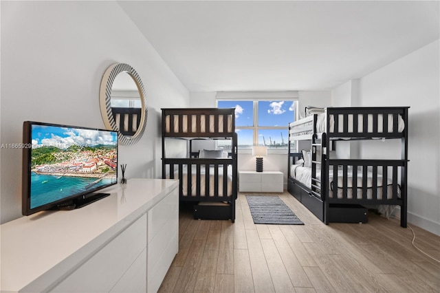 bedroom with light wood-type flooring