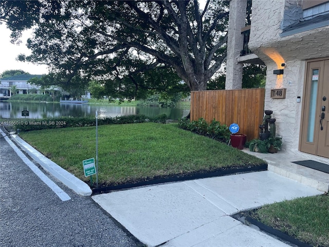 view of yard with a water view