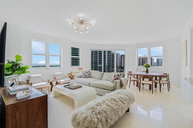 living room featuring a notable chandelier and plenty of natural light