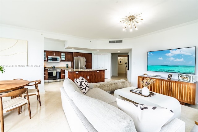 living room featuring an inviting chandelier