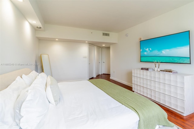 bedroom featuring hardwood / wood-style flooring