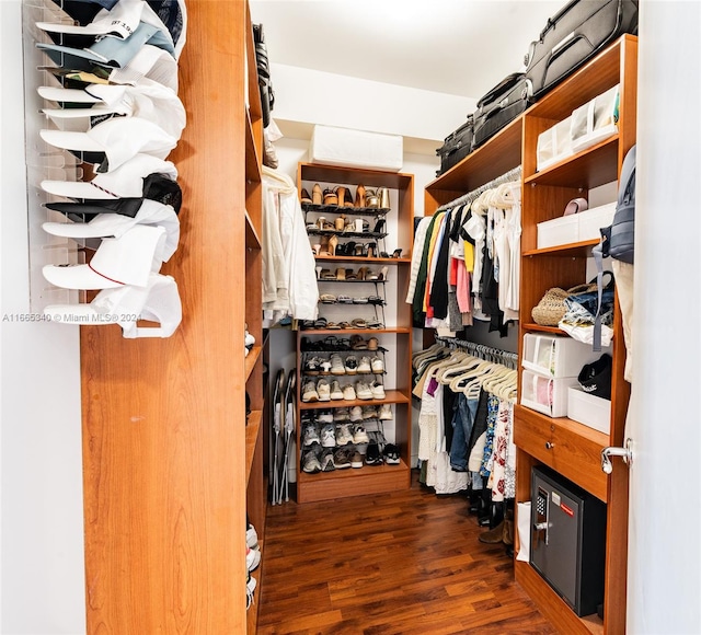 walk in closet featuring dark hardwood / wood-style floors