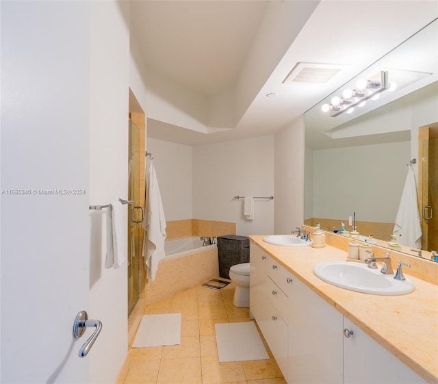 full bathroom with vanity, toilet, plus walk in shower, and tile patterned floors