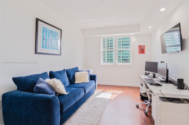 office area with light hardwood / wood-style flooring