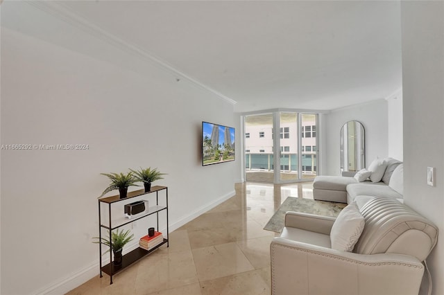 living room with light tile patterned floors and crown molding