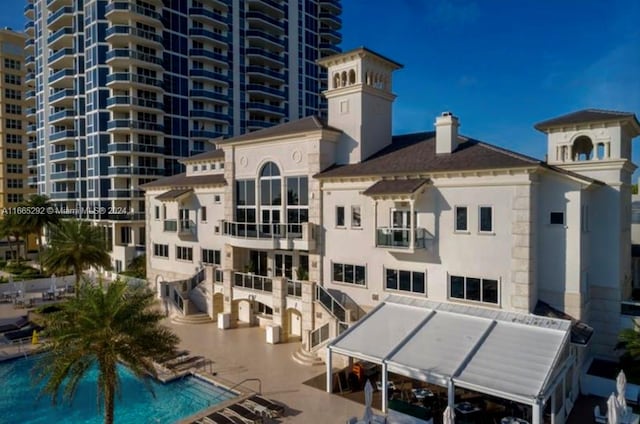 exterior space featuring a community pool