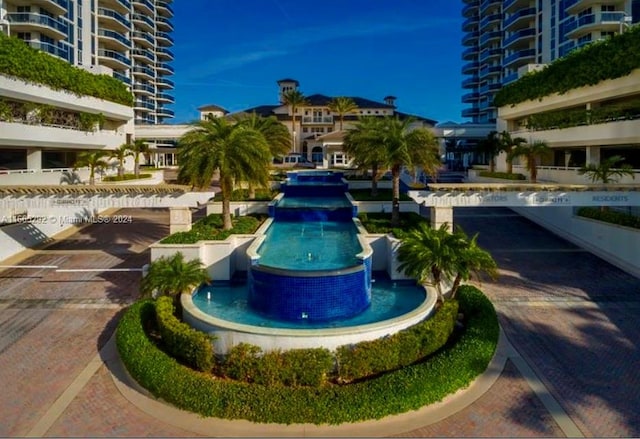 view of pool featuring pool water feature