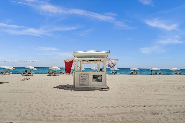 view of water feature with a view of the beach and a gazebo