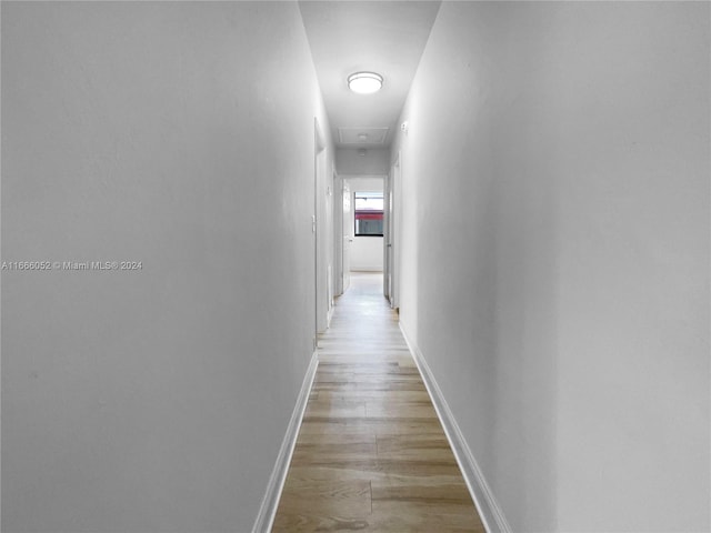 hallway featuring light hardwood / wood-style flooring