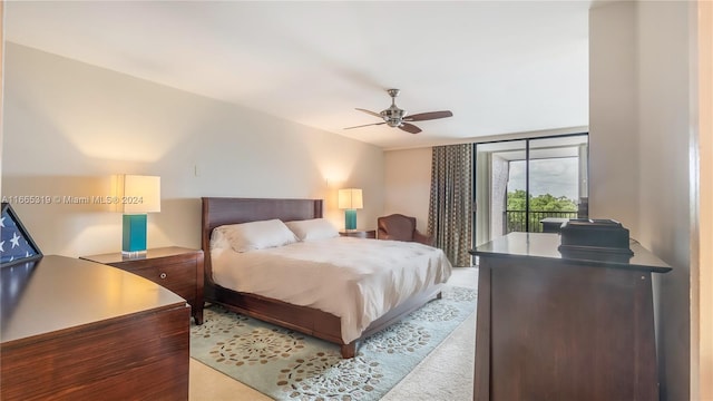 bedroom featuring ceiling fan and access to outside