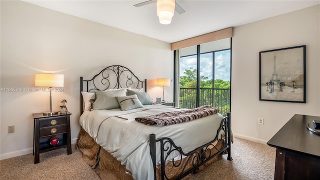 bedroom with carpet floors, access to outside, and ceiling fan