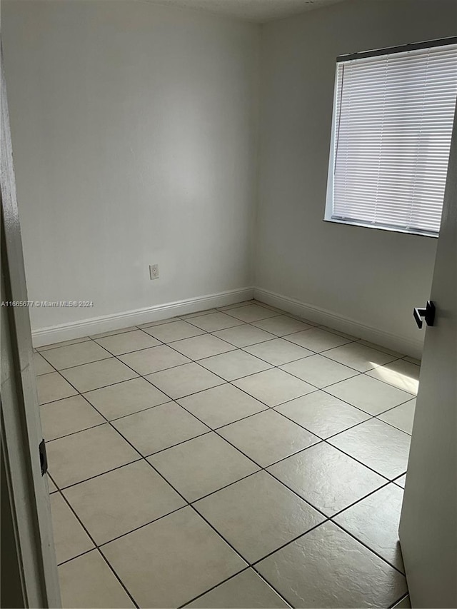 view of tiled empty room