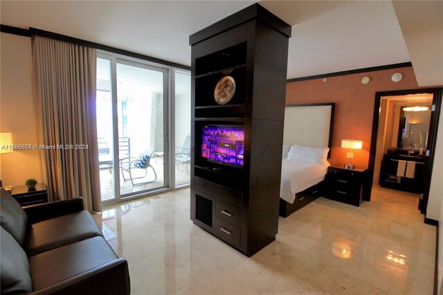 1437 Collins Ave Unit 304, Miami Beach, FL 33139 - living area with light tile patterned floors and a wall of windows
