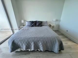 bedroom with baseboards