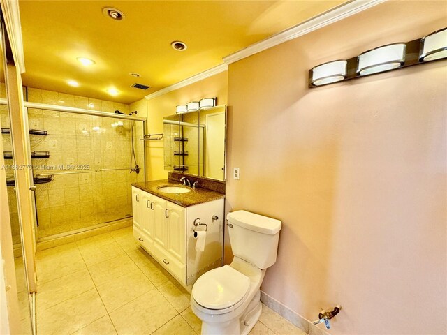 bathroom featuring tile patterned flooring and a shower with shower door