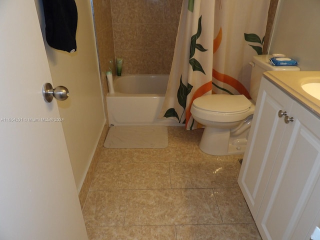 full bathroom with shower / tub combo, tile patterned flooring, vanity, and toilet