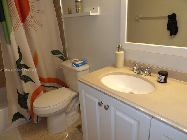 full bathroom with shower / bath combo, vanity, and toilet