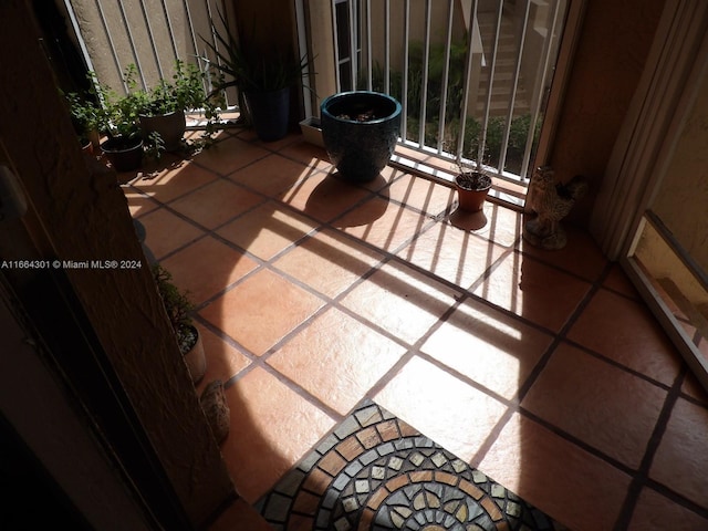 view of patio featuring a balcony