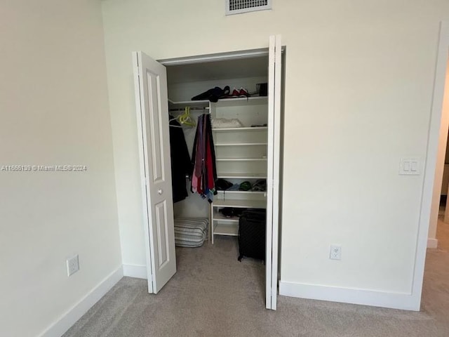 utility room featuring heating unit