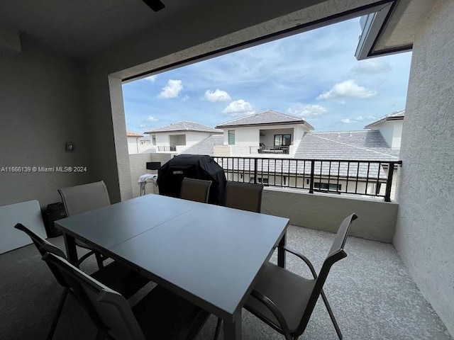 view of patio / terrace with ceiling fan and grilling area