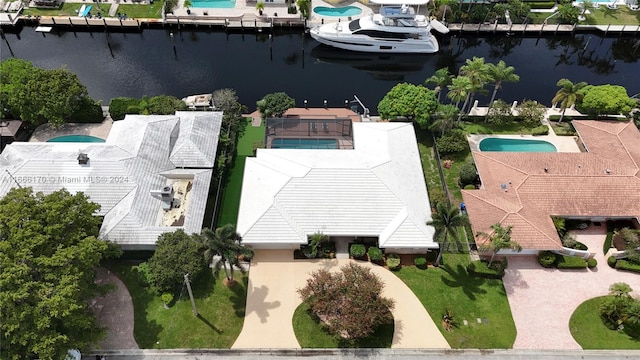 drone / aerial view featuring a water view