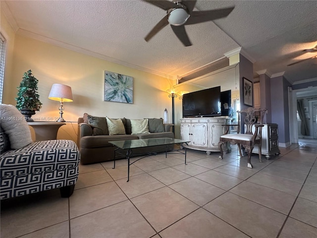 tiled living room with ceiling fan, crown molding, and a textured ceiling