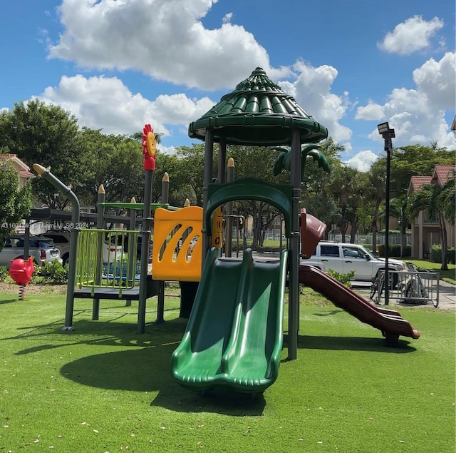 view of play area with a yard