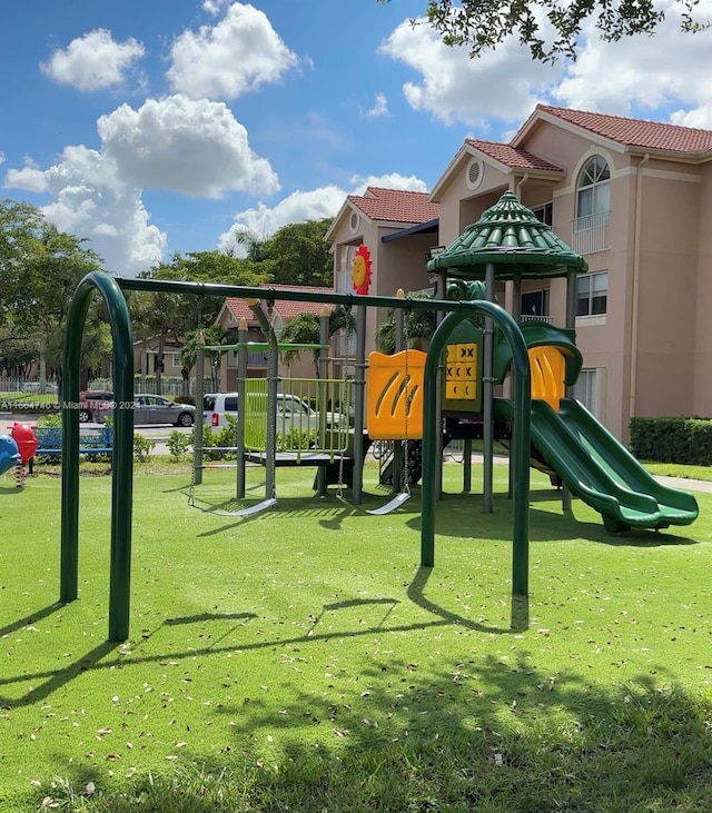 view of jungle gym with a yard