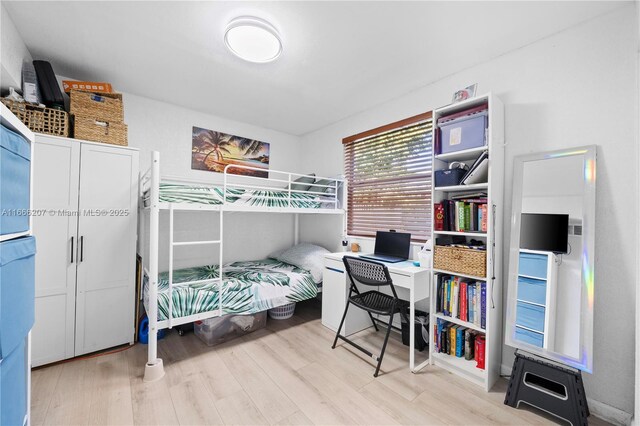 bedroom with wood finished floors