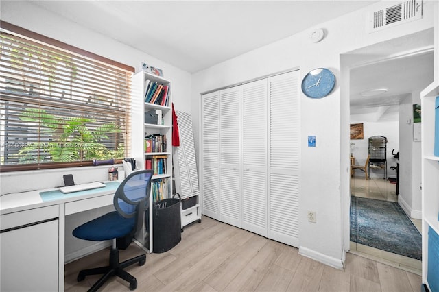 office area featuring light hardwood / wood-style floors