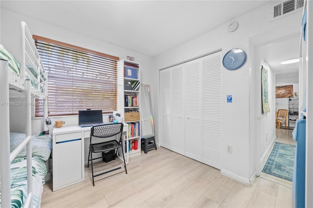 office featuring visible vents and light wood-style floors