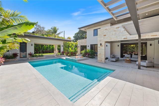 view of swimming pool featuring an outdoor hangout area and a patio area