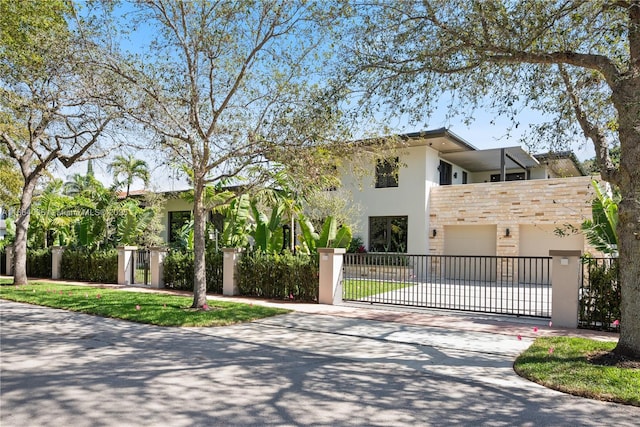 view of front of property with a garage