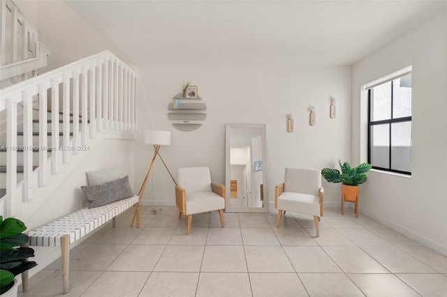 sitting room featuring light tile patterned floors