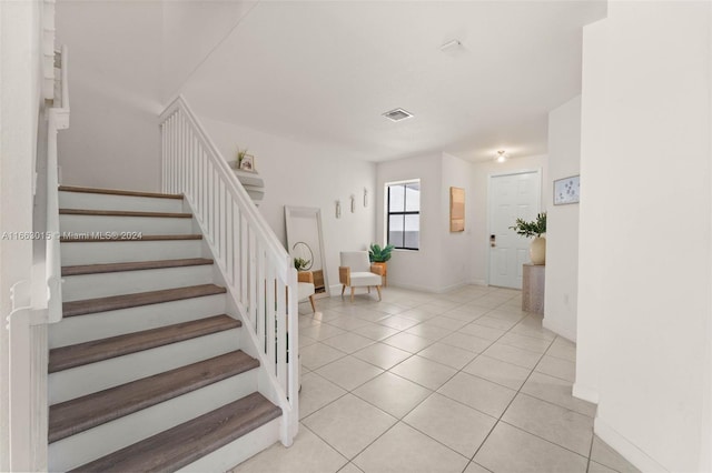 view of tiled entrance foyer