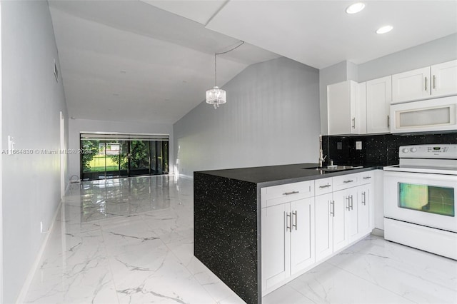 kitchen with decorative backsplash, white cabinetry, vaulted ceiling, white appliances, and decorative light fixtures